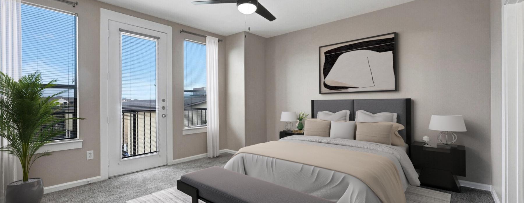 a bedroom with a bed and a fan
