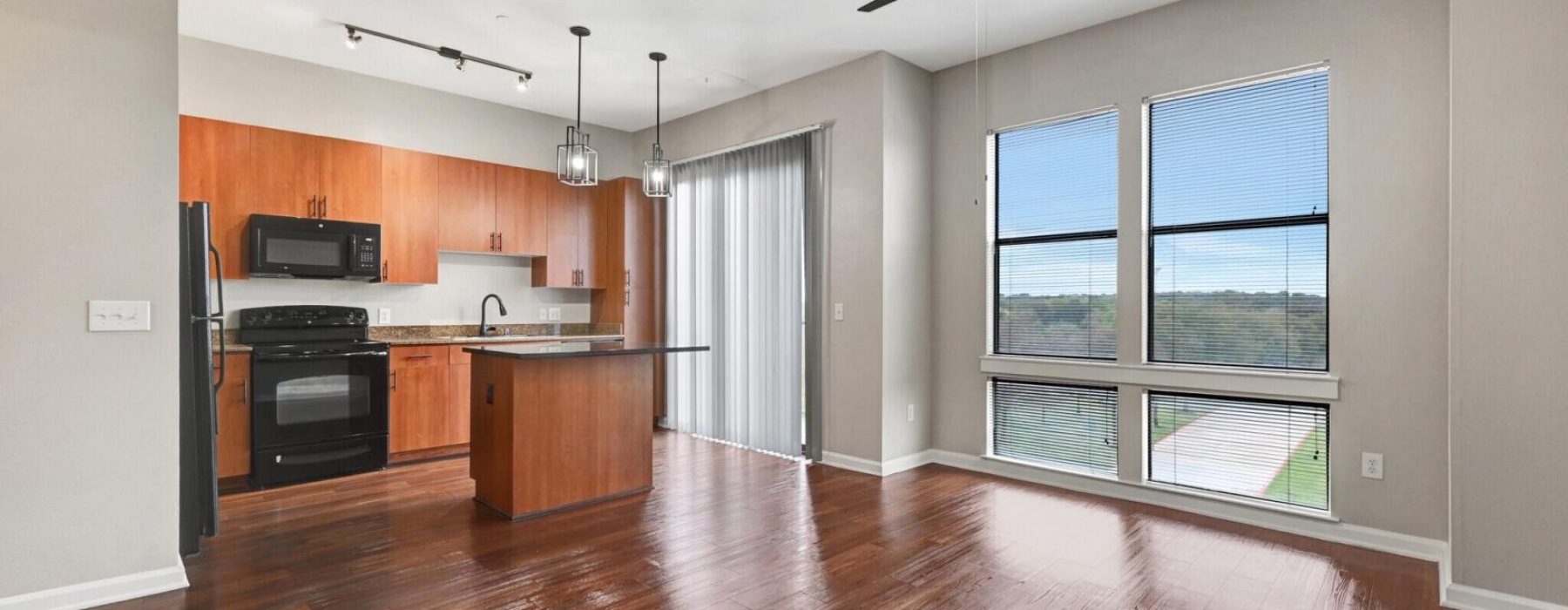 a kitchen with a wood floor